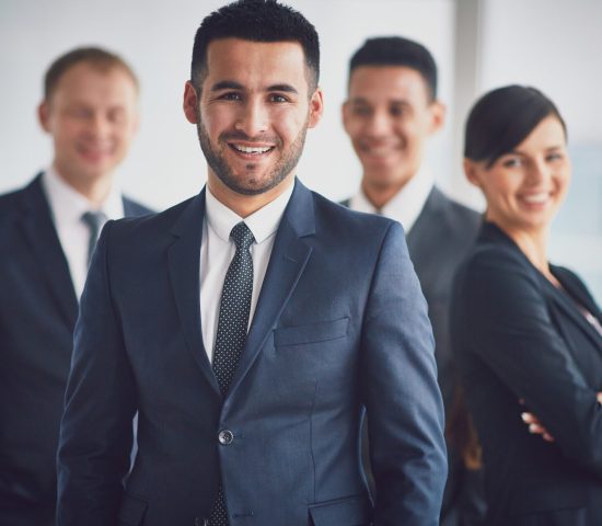 confident-business-team-with-leader